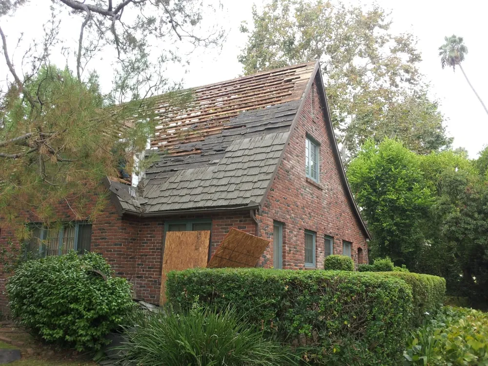 Slide of Tim Outzen Roofing