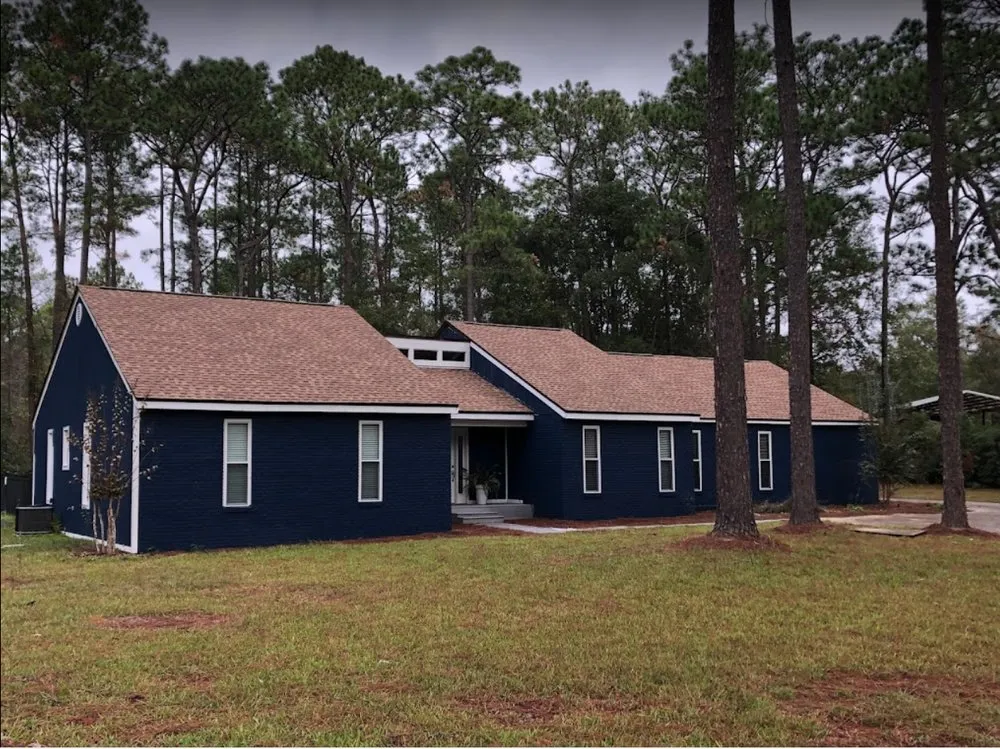 Slide of Timberman Roofing