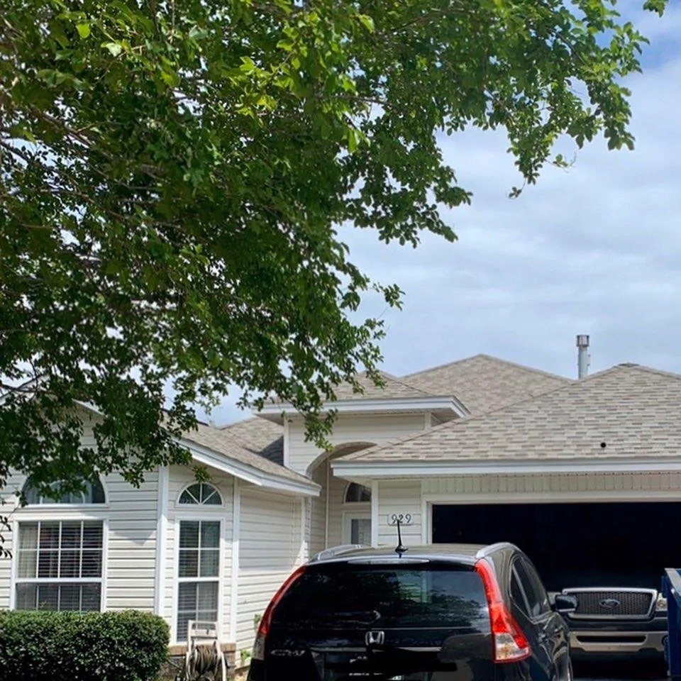 Slide of Timberman Roofing