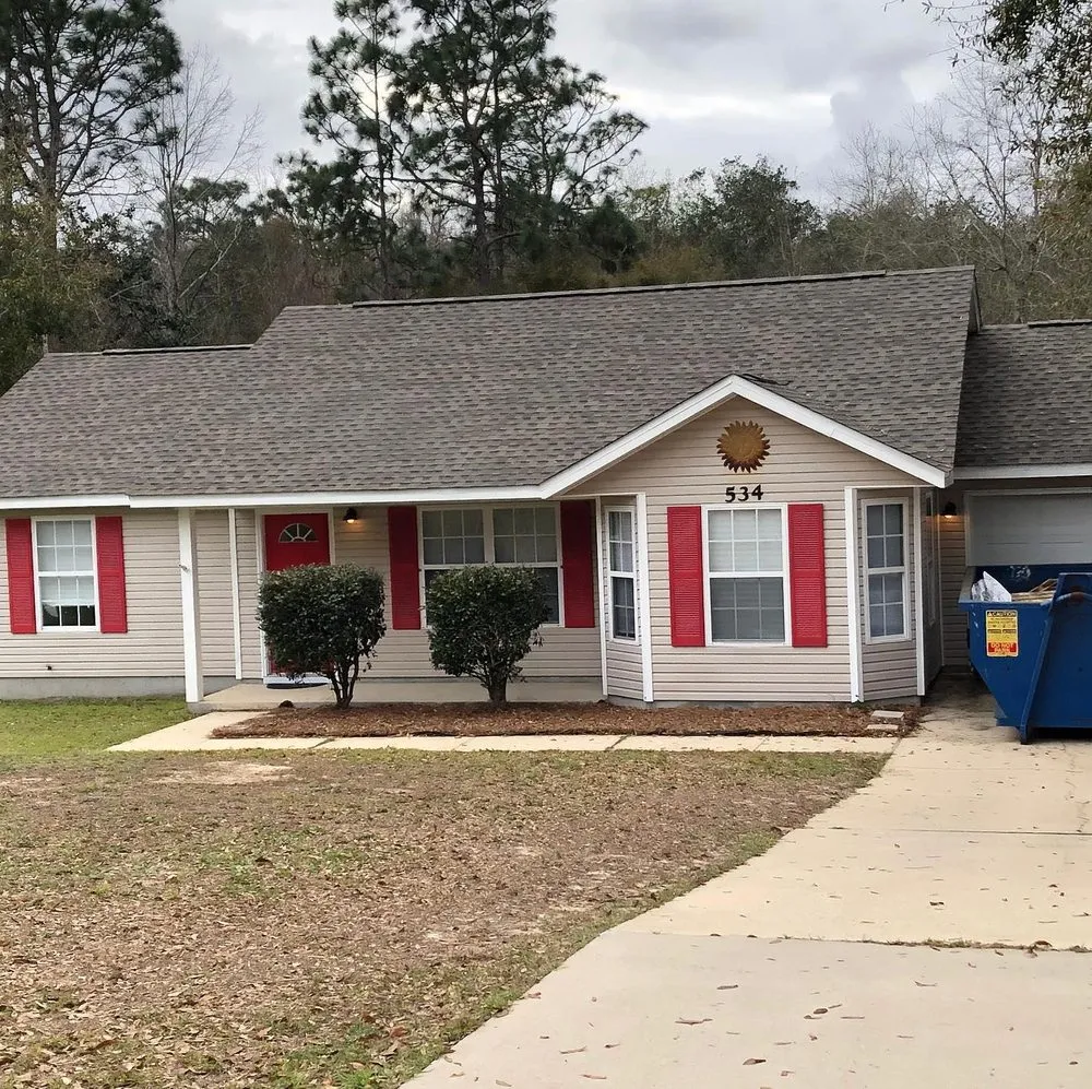 Slide of Timberman Roofing