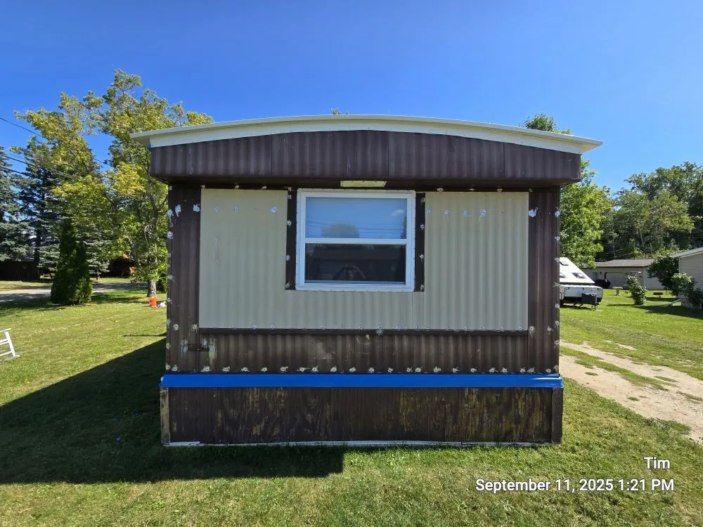 Slide of Tims Paint and Car Repair