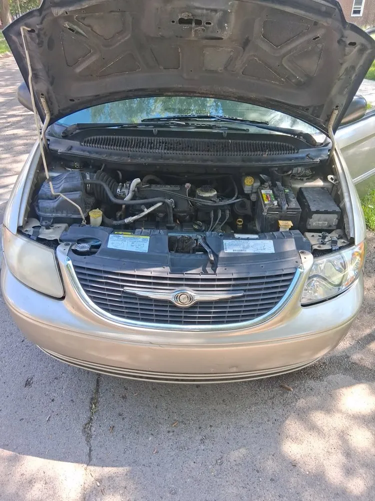 Slide of Tims Paint and Car Repair