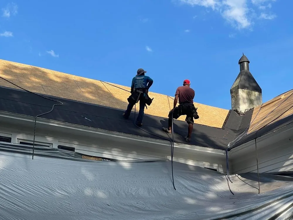 Slide of Tim's Roof Contractors