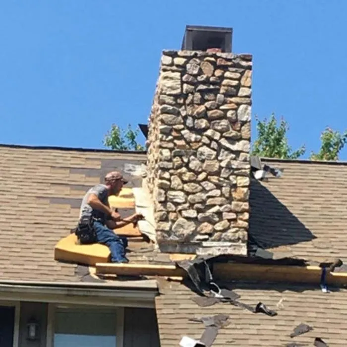 Slide of Tim's Roof Contractors