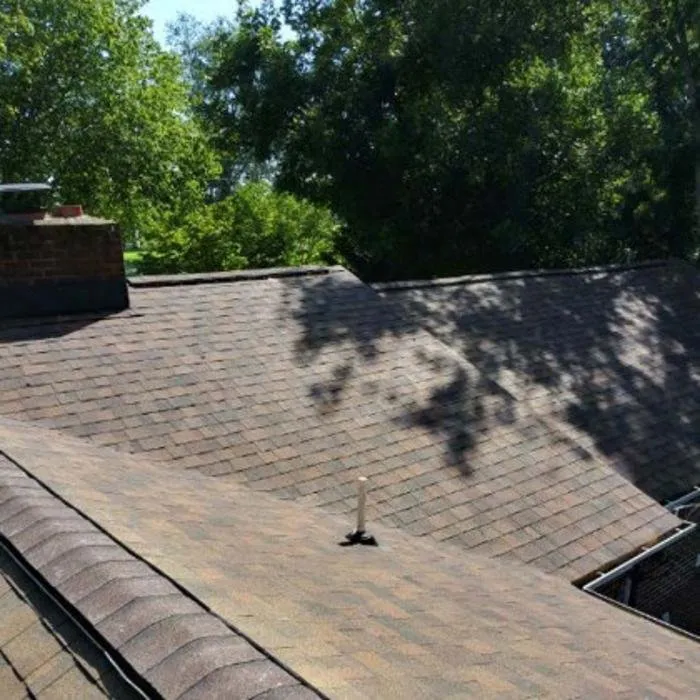 Slide of Tim's Roof Contractors