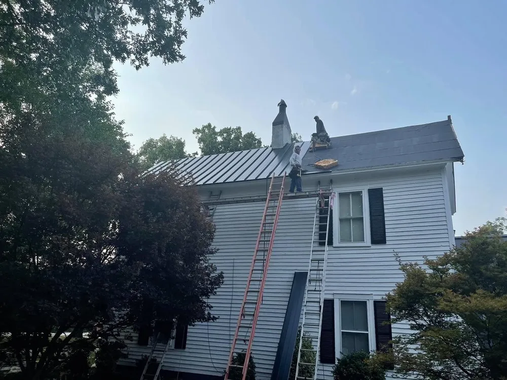 Slide of Tim's Roof Contractors