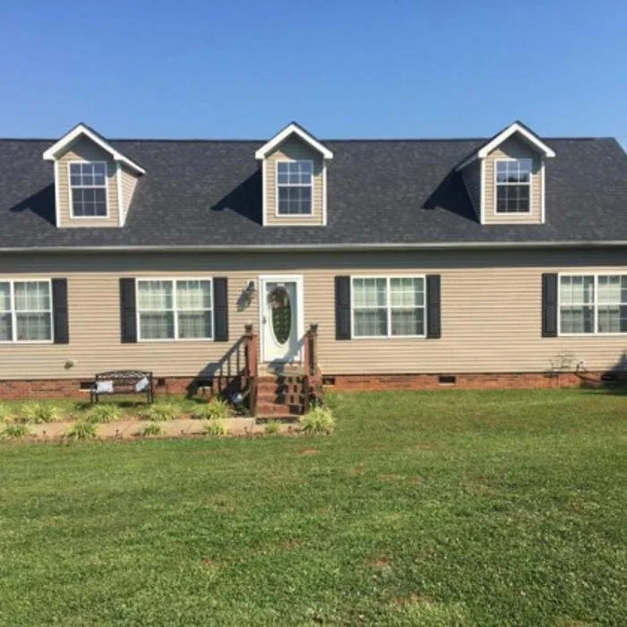 Slide of Tim's Roof Contractors