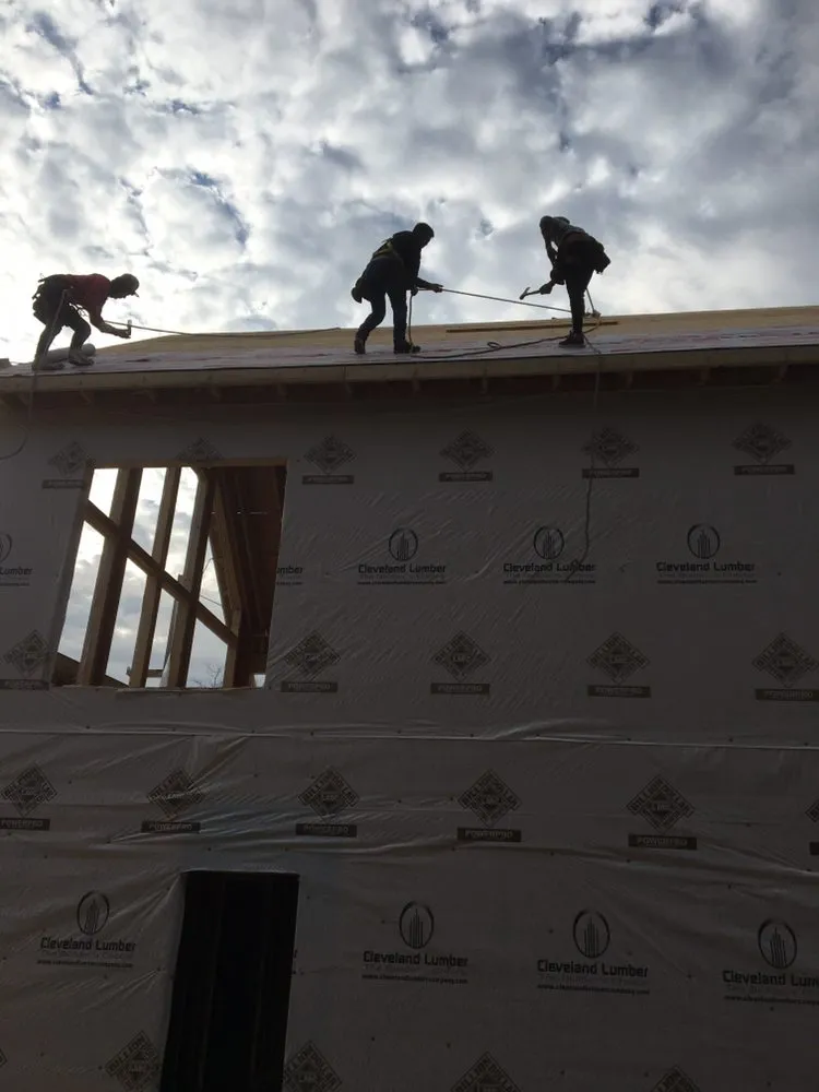 Slide of Tim's Roof Contractors