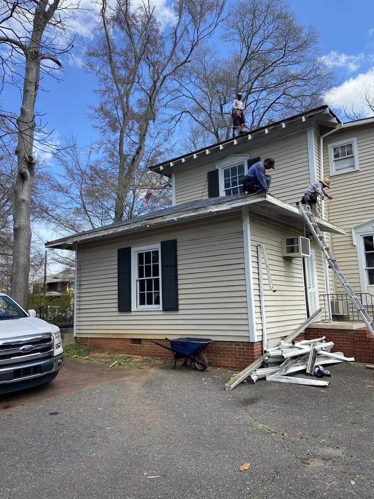 Slide of Tim's Roof Contractors