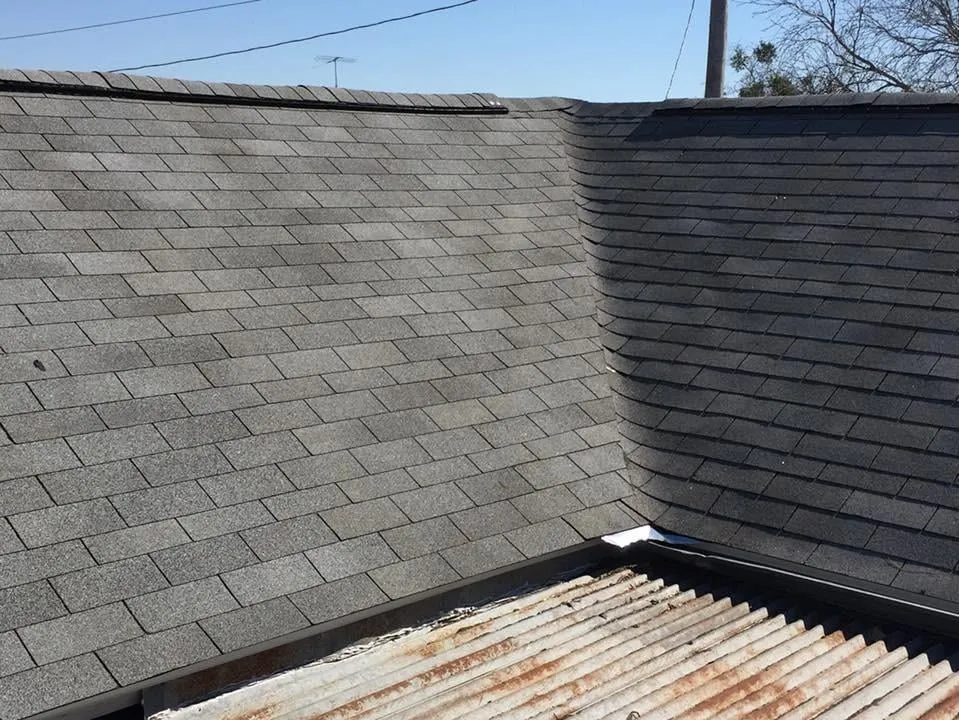 Slide of Tim's Roofing