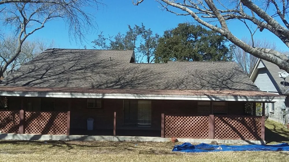 Slide of Tim's Roofing