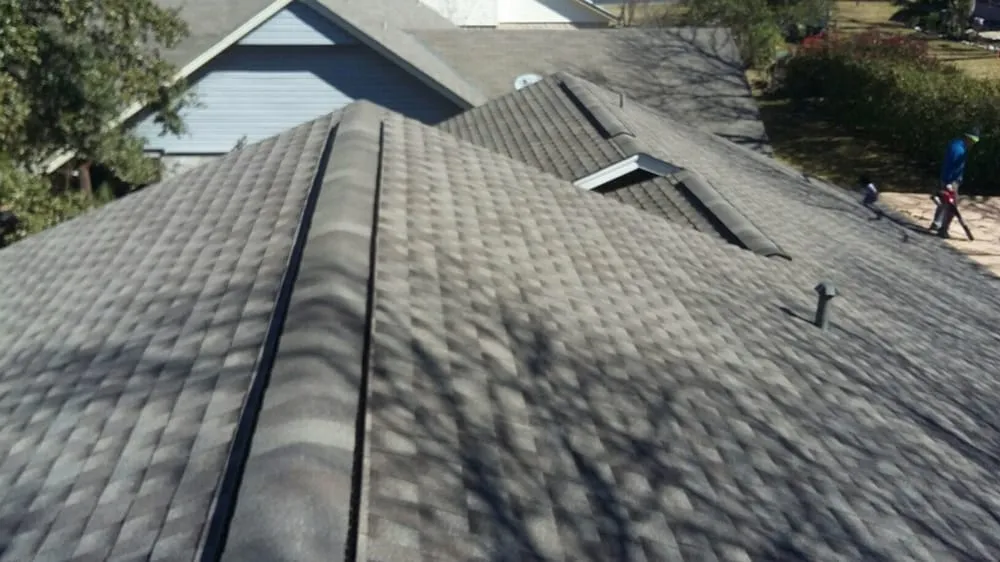 Slide of Tim's Roofing