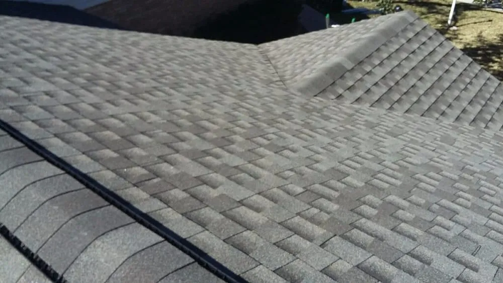 Slide of Tim's Roofing