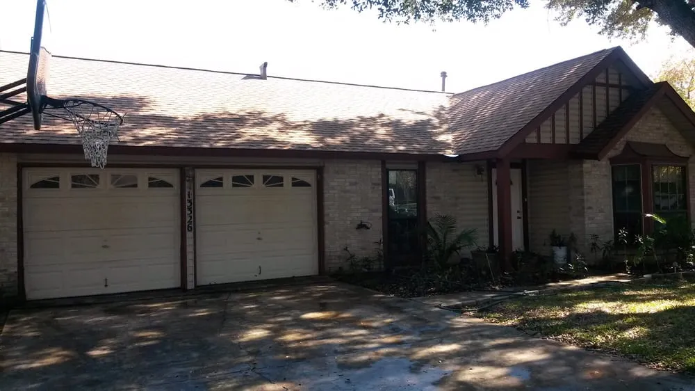 Slide of Tim's Roofing