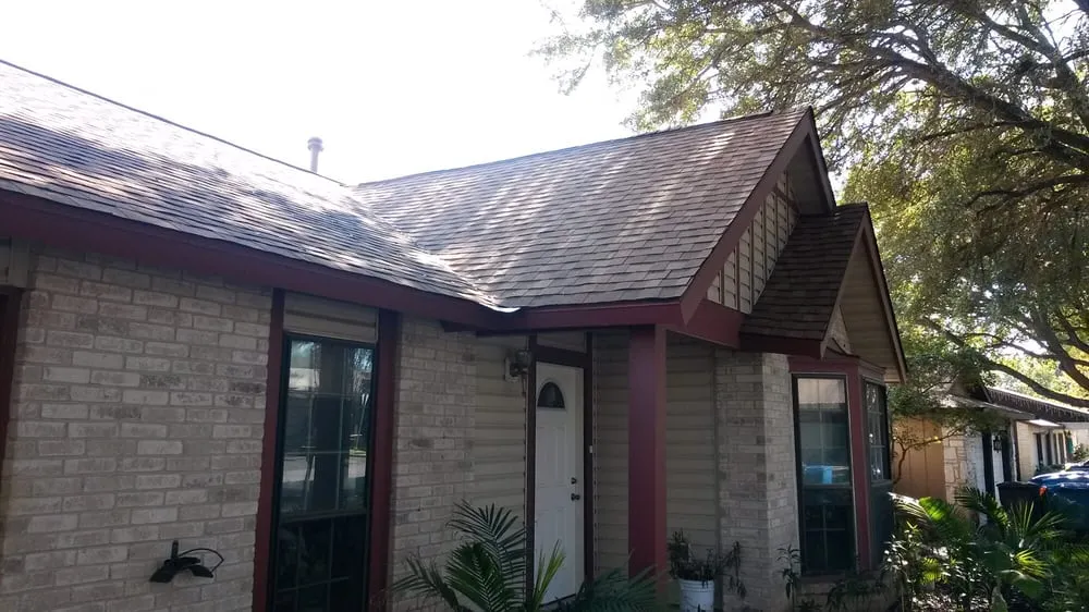 Slide of Tim's Roofing