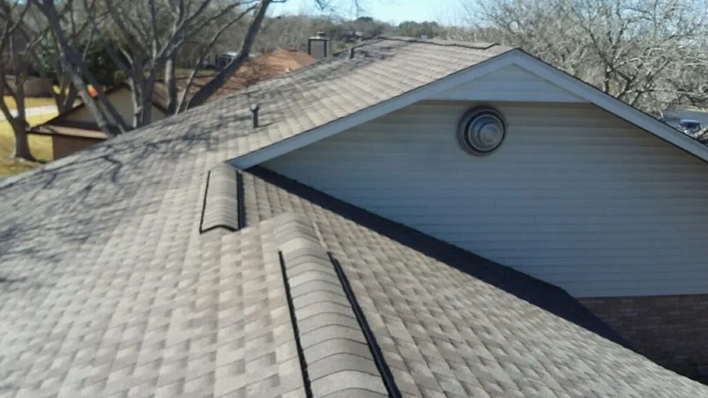 Slide of Tim's Roofing