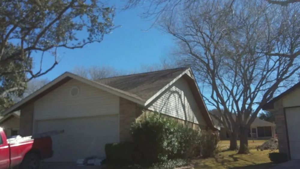 Slide of Tim's Roofing