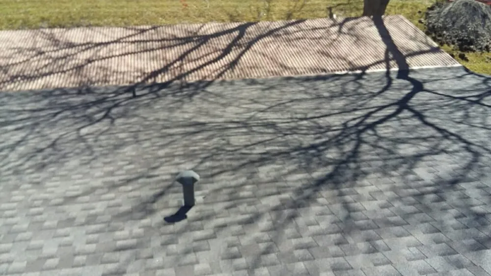 Slide of Tim's Roofing