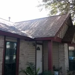 Slide of Tim's Roofing