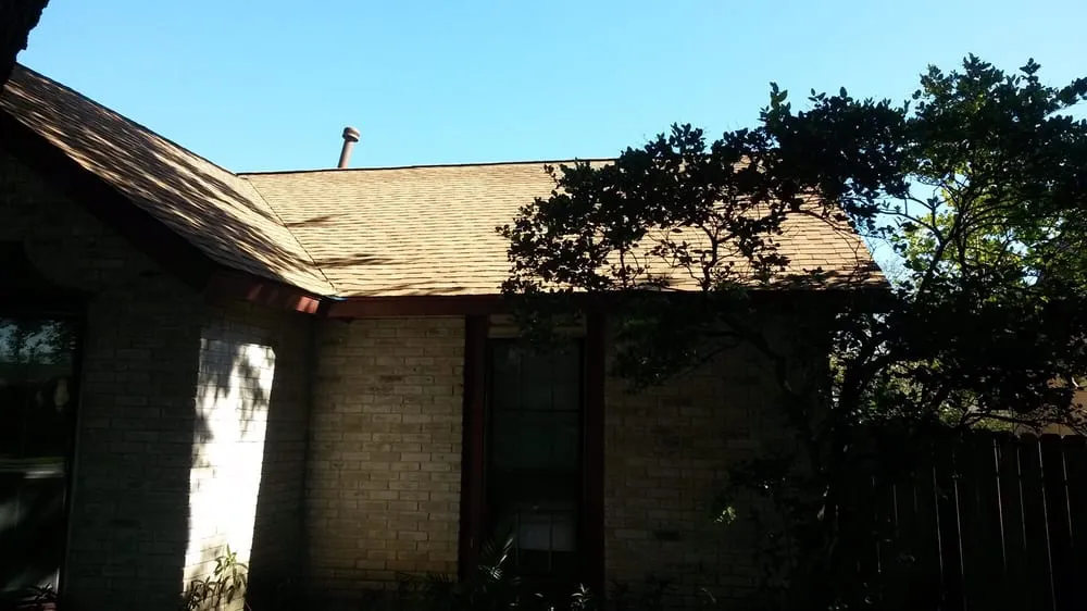 Slide of Tim's Roofing