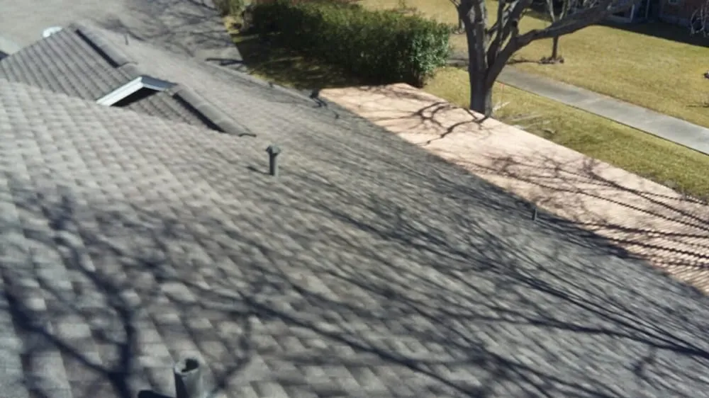 Slide of Tim's Roofing