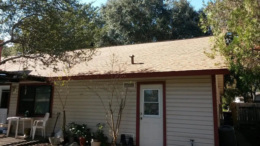 Slide of Tim's Roofing