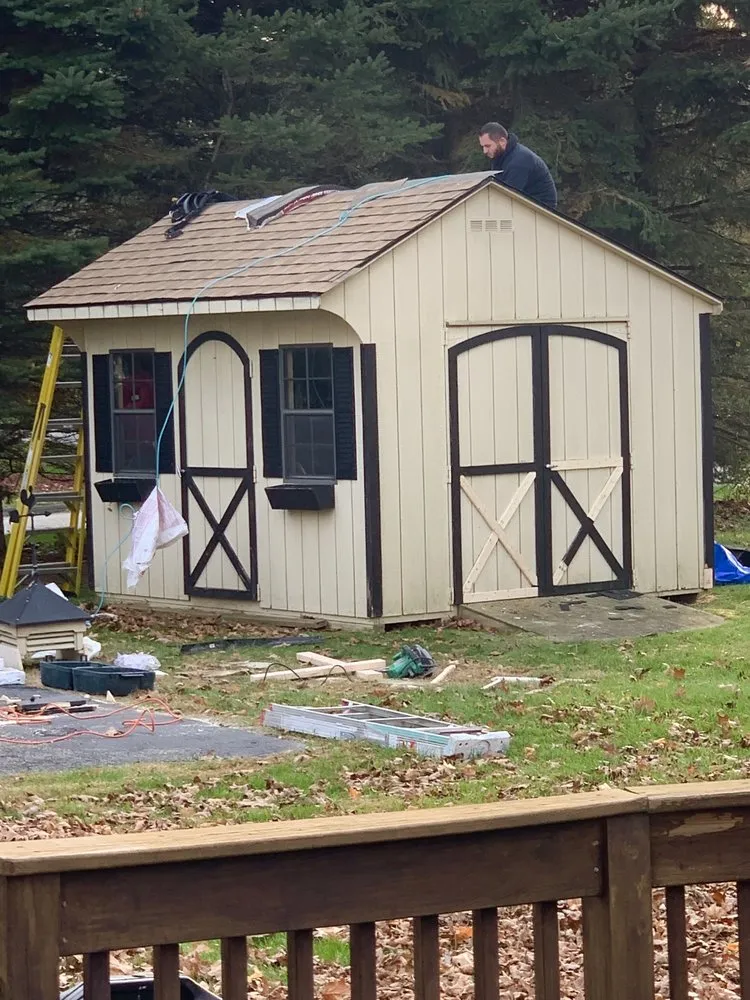 Slide of Tim’s Roofing services