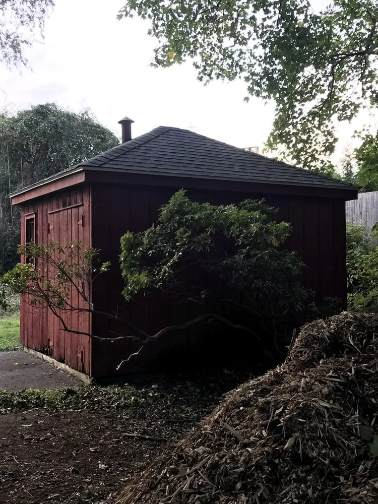 Slide of Tim’s Roofing services