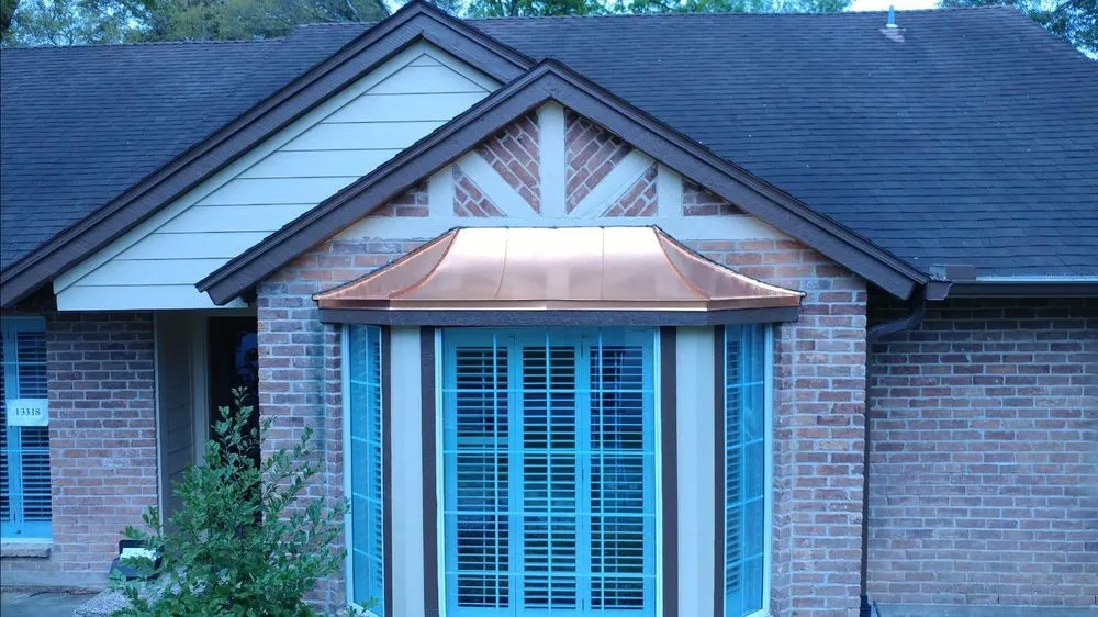 Slide of Tin Man Sheet Metal & Roofing