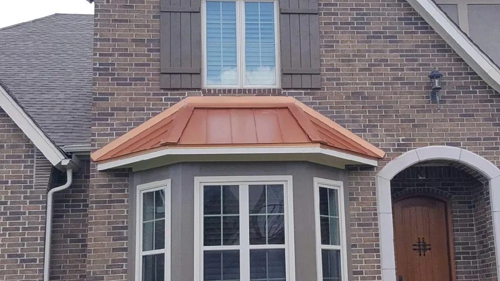 Slide of Tin Man Sheet Metal & Roofing