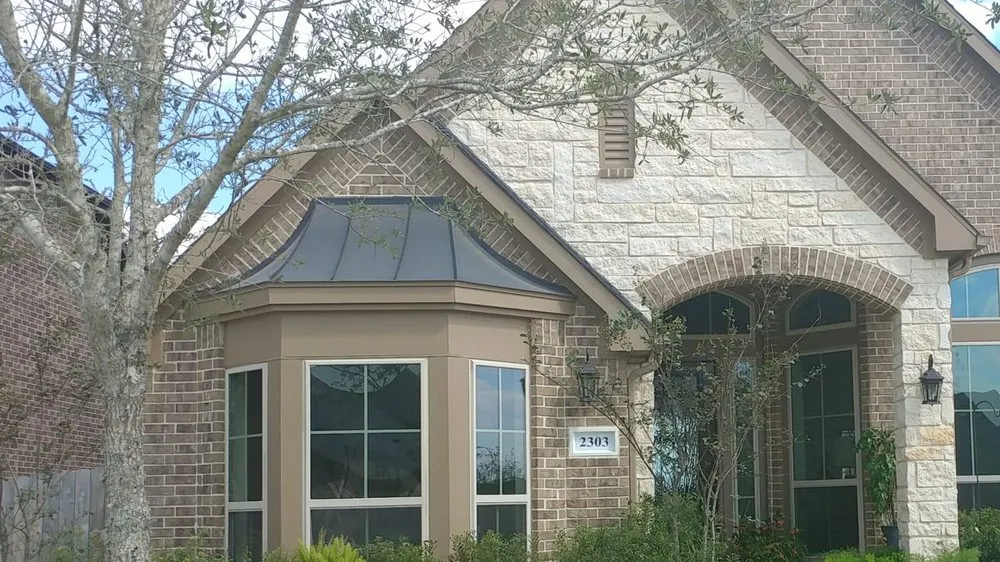 Slide of Tin Man Sheet Metal & Roofing