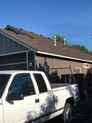 Slide of Tin Shield Roofing