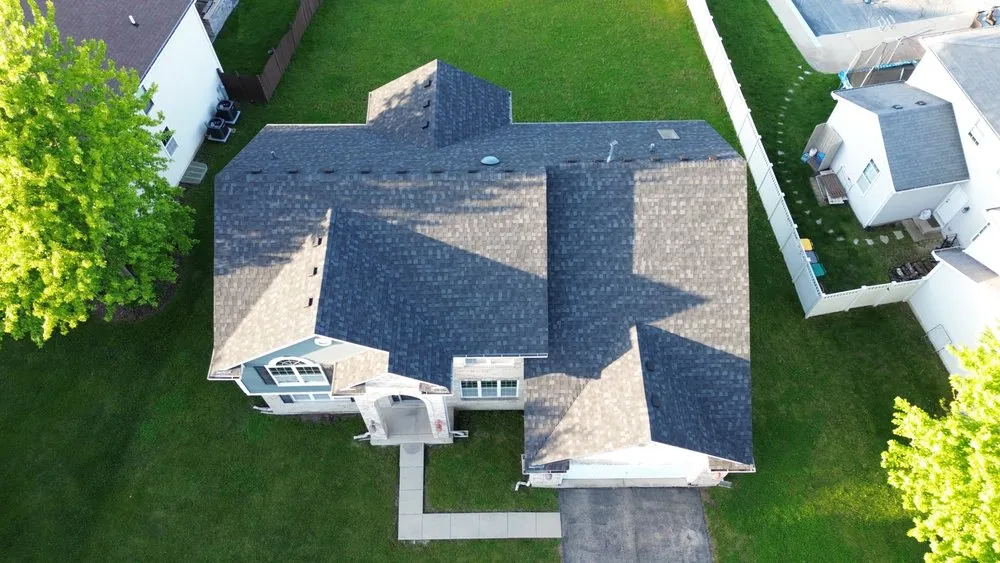 Slide of Tinos Roofing