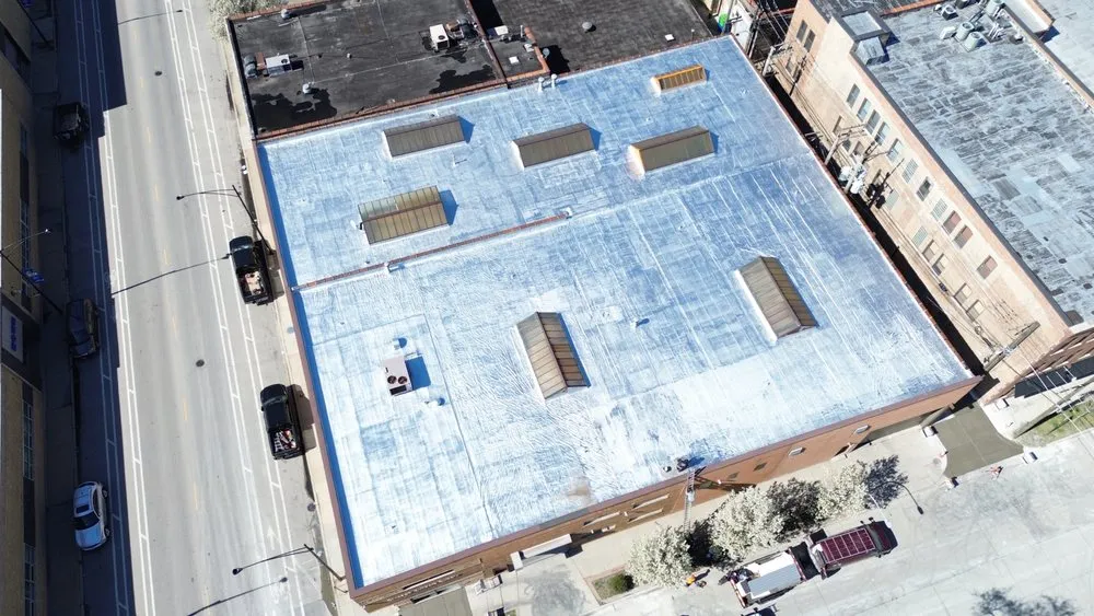 Slide of Tinos Roofing