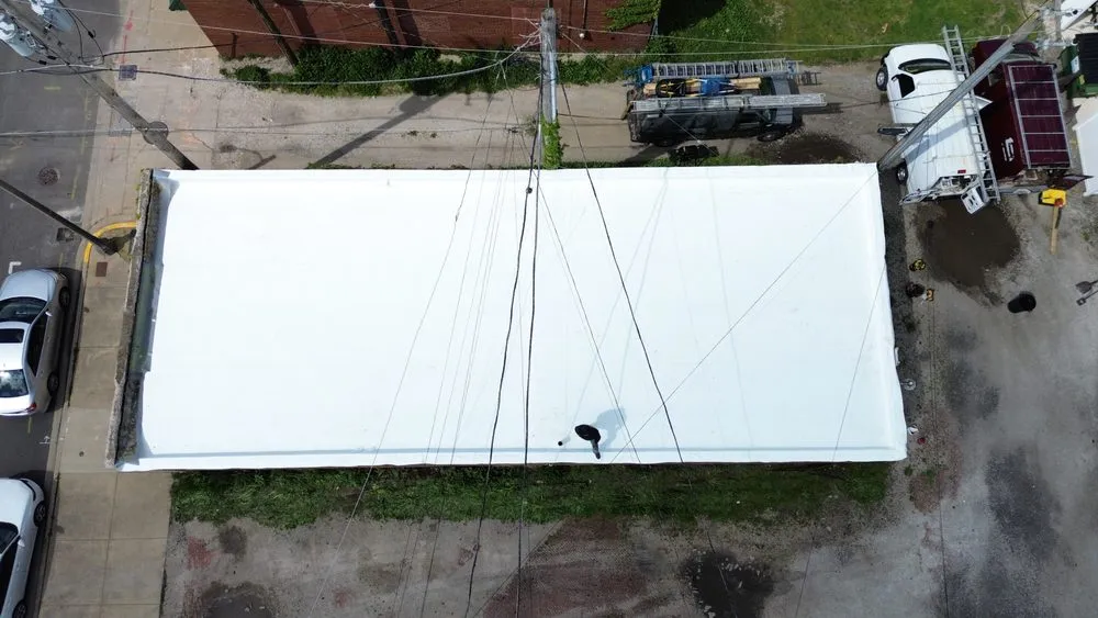 Slide of Tinos Roofing