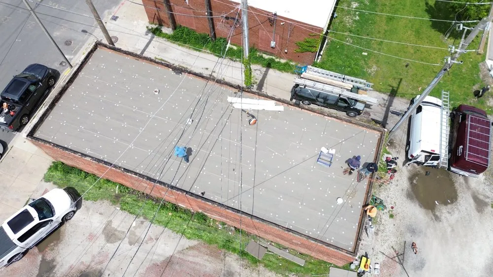 Slide of Tinos Roofing