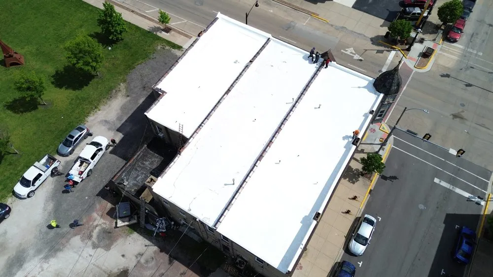 Slide of Tinos Roofing