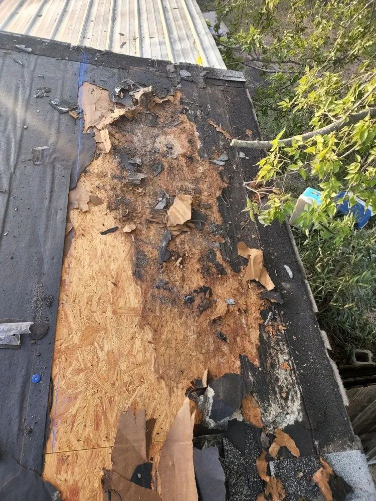 Slide of Tinsley Roofing