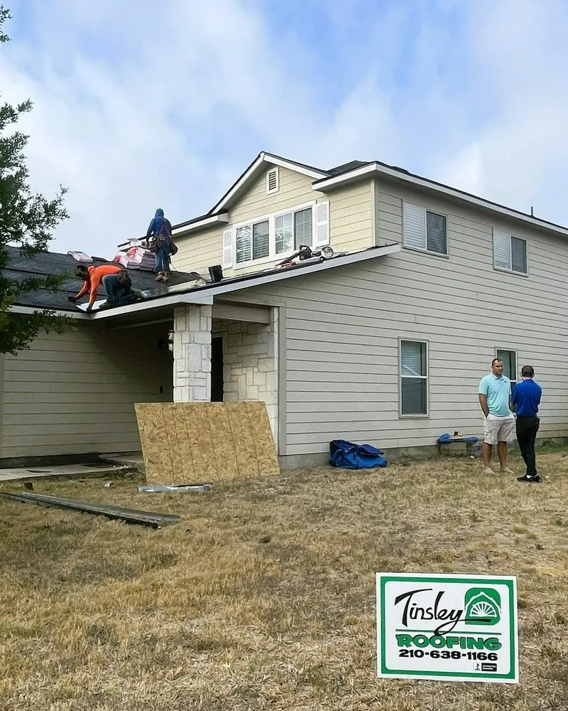 Slide of Tinsley Roofing