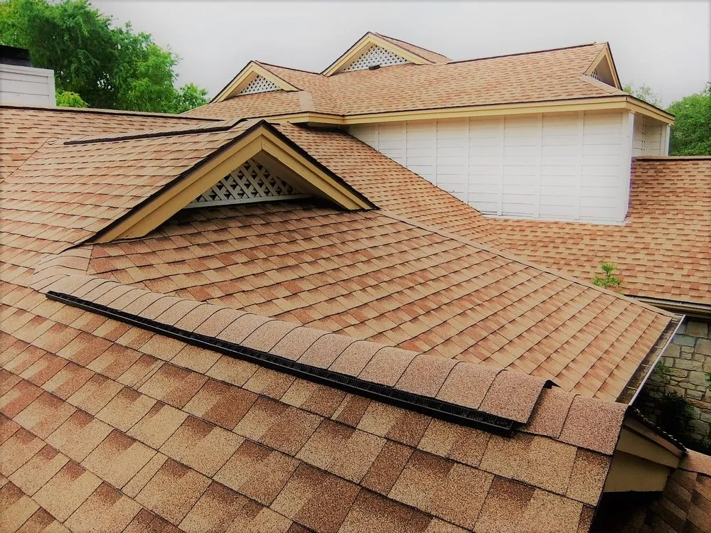 Slide of Tinsley Roofing