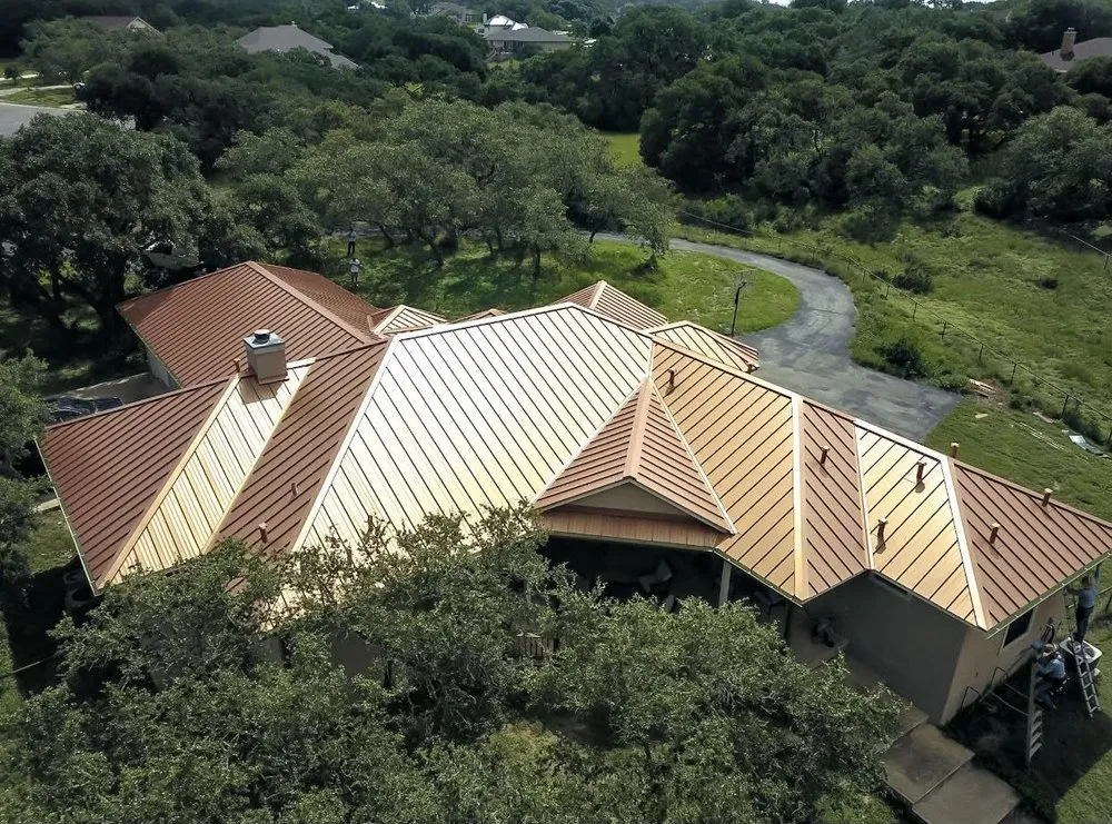 Slide of Tinsley Roofing