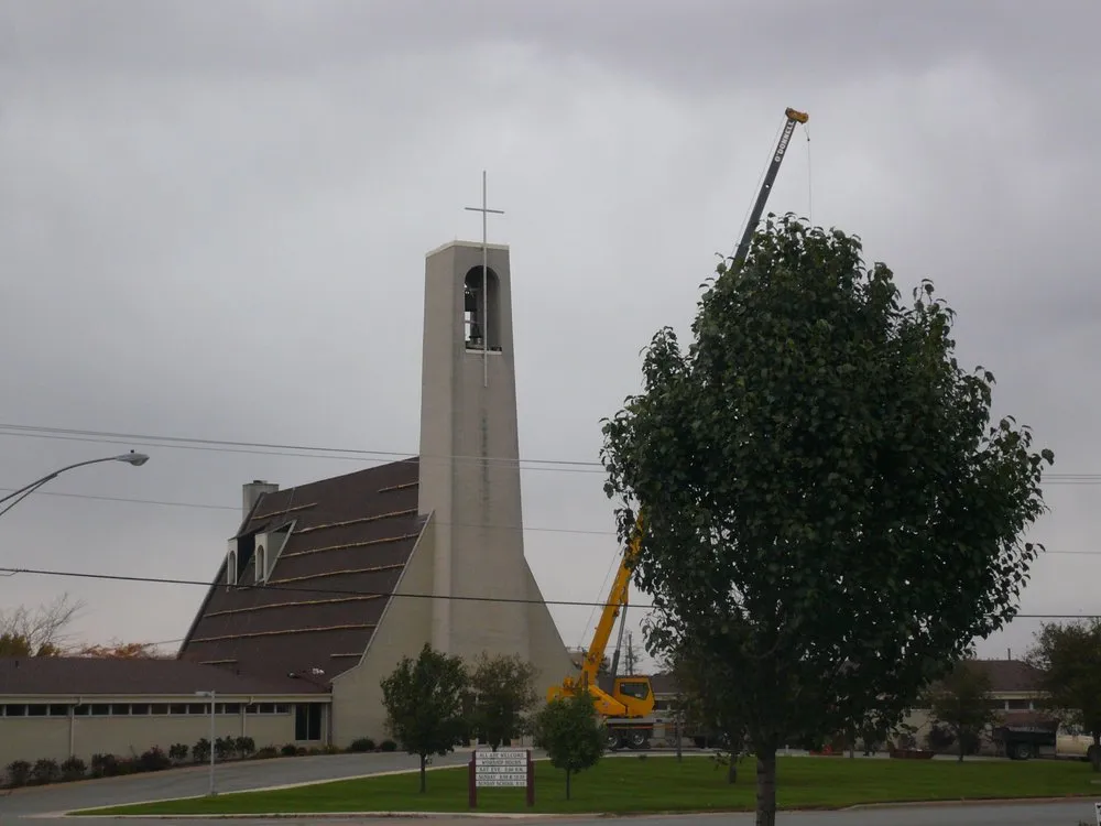 Slide of Tip Top Roofing & Construction
