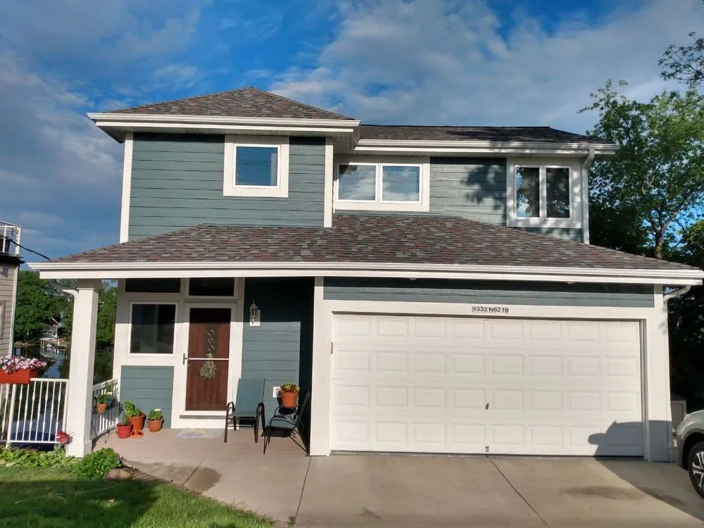 Slide of Tip Top Roofing & Gutters