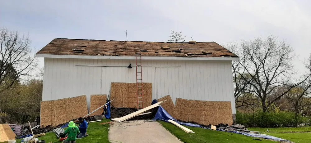 Slide of Tip Top Roofing & Gutters