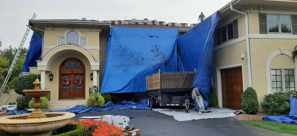 Slide of Tip Top Roofing & Gutters