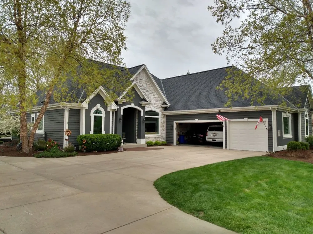 Slide of Tip Top Roofing & Gutters