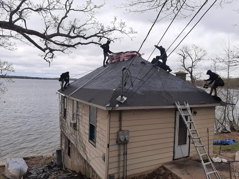 Slide of Tip Top Roofing & Gutters
