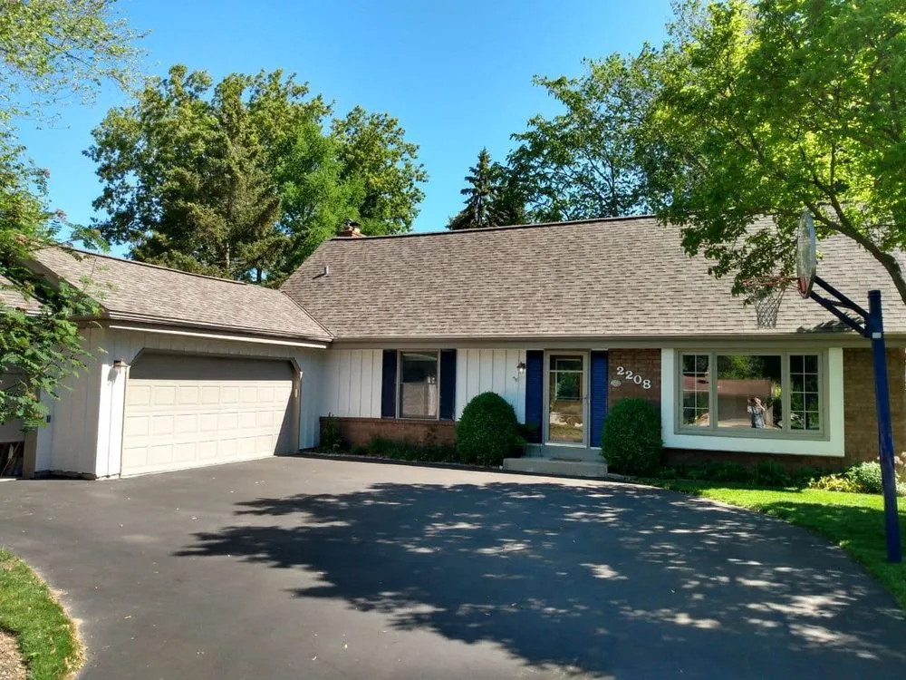 Slide of Tip Top Roofing & Gutters