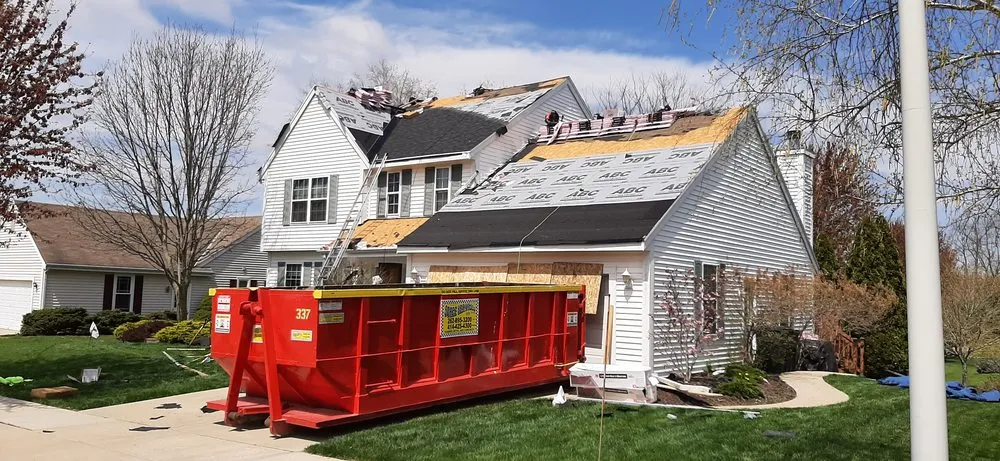 Slide of Tip Top Roofing & Gutters