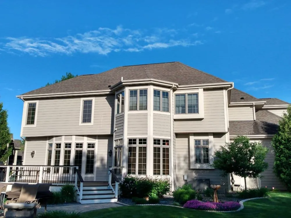 Slide of Tip Top Roofing & Gutters